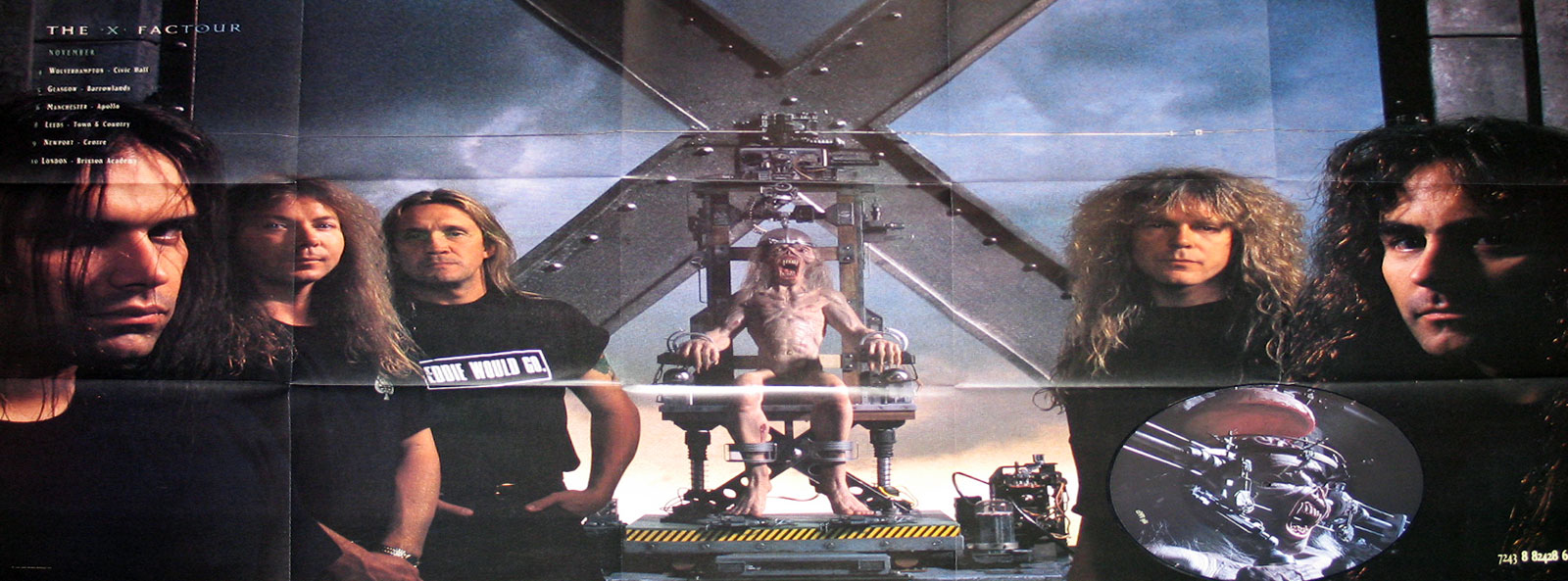 Wide, folded poster used as the back cover: five members of Iron Maiden stand across the foreground against a blue-grey, stormy sky. At center rear, the band’s mascot Eddie, pale and snarling, is strapped to a mechanical chair on rails beneath a giant metal X frame. Upper left shows a list titled THE X FACTOUR with November venues. Horizontal and vertical crease lines cross the sheet. Lower right includes a round inset reproducing the picture-disc artwork. Dark clothing, long hair, and cold metallic tones dominate.