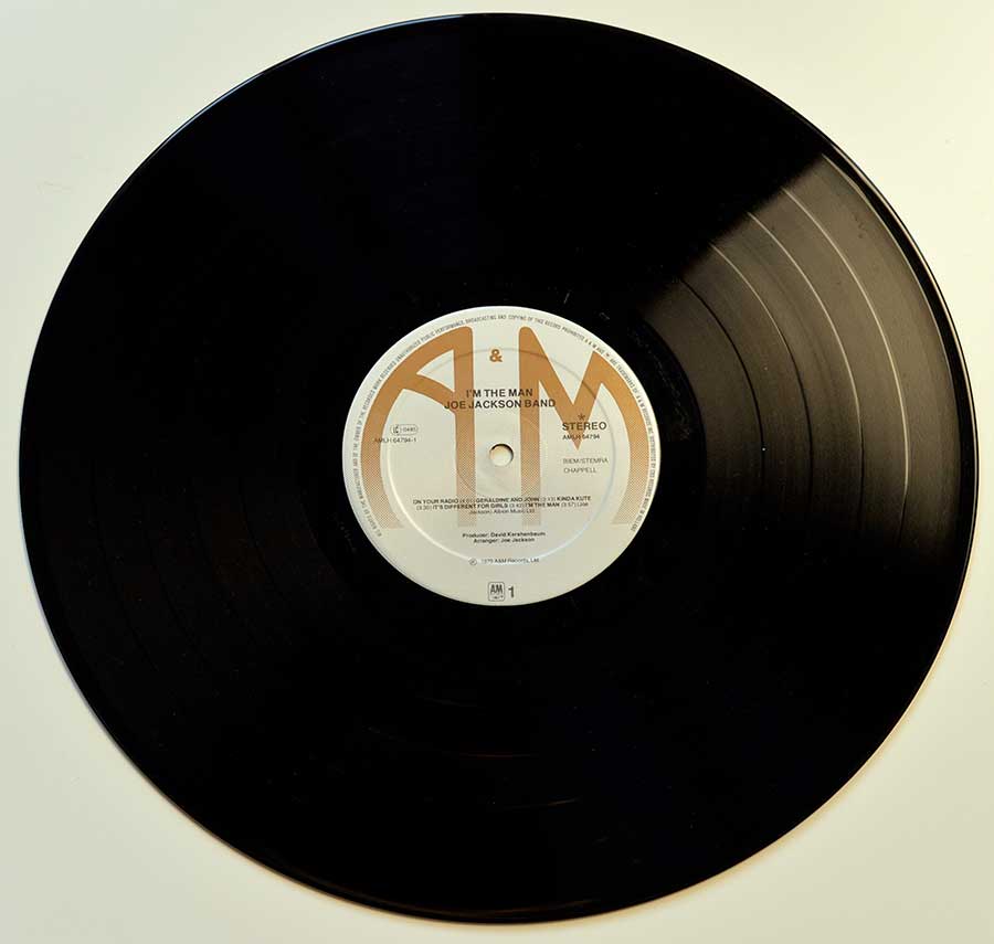 Close up of Side One record's label JOE JACKSON - I’m The Man 12" Vinyl LP Album