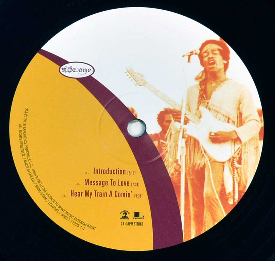 Close up of record's label JIMI HENDRIX - Live at Woodstock 3LP 12" Vinyl LP Album  Side One