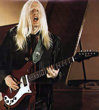 Photo of Johnny Winter Playing Red Epiphone https://vinyl-records.nl/