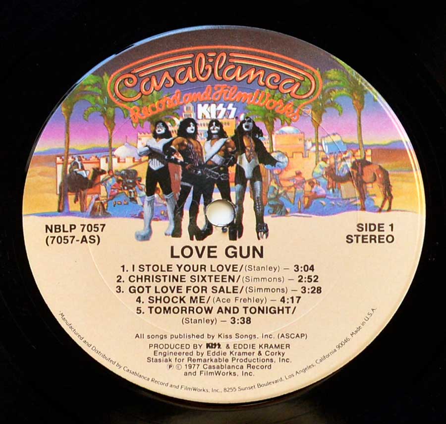 Close up of record's label KISS - Love Gun USA release 12" Vinyl LP Album  Side One