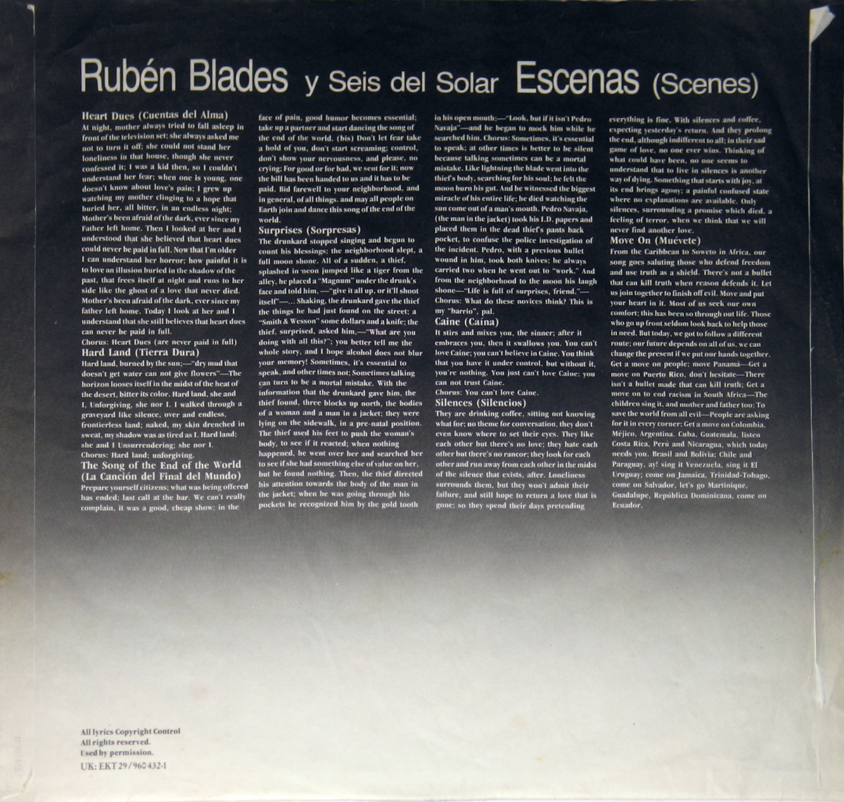 Inner sleeve of Rubén Blades' album 'Escenas' featuring a black and white gradient background with white text. Lyrics and translations for songs like 'Cuentas del Alma,' 'Tierra Dura,' and 'Sorpresas' are printed in a clean, structured layout, providing insight into the album's themes of social commentary and storytelling.