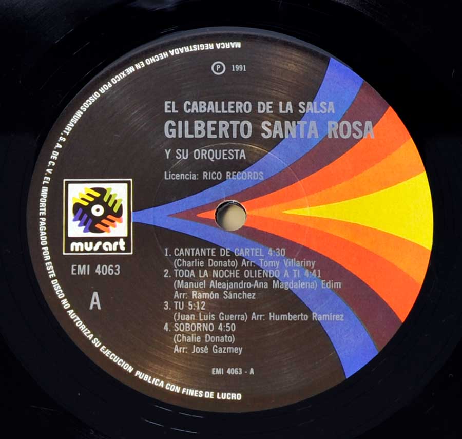 Close-up Photo of "GILBERTO SANTA ROSA - El Caballero de Salsa" Record Label  