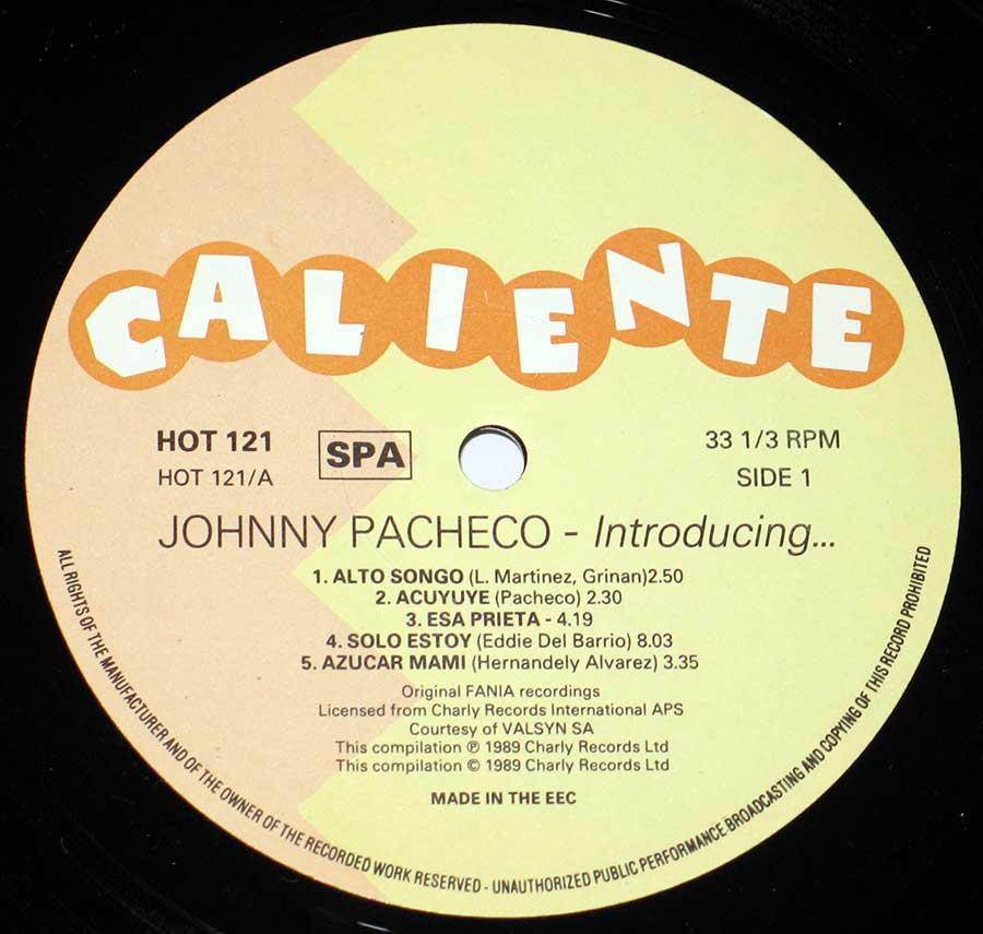 Close up of "Introducing JOHNNY PACHECO" Record Label Details: Caliente HOT 121 © and ℗ 1989 Charly Records Sound Copyright 