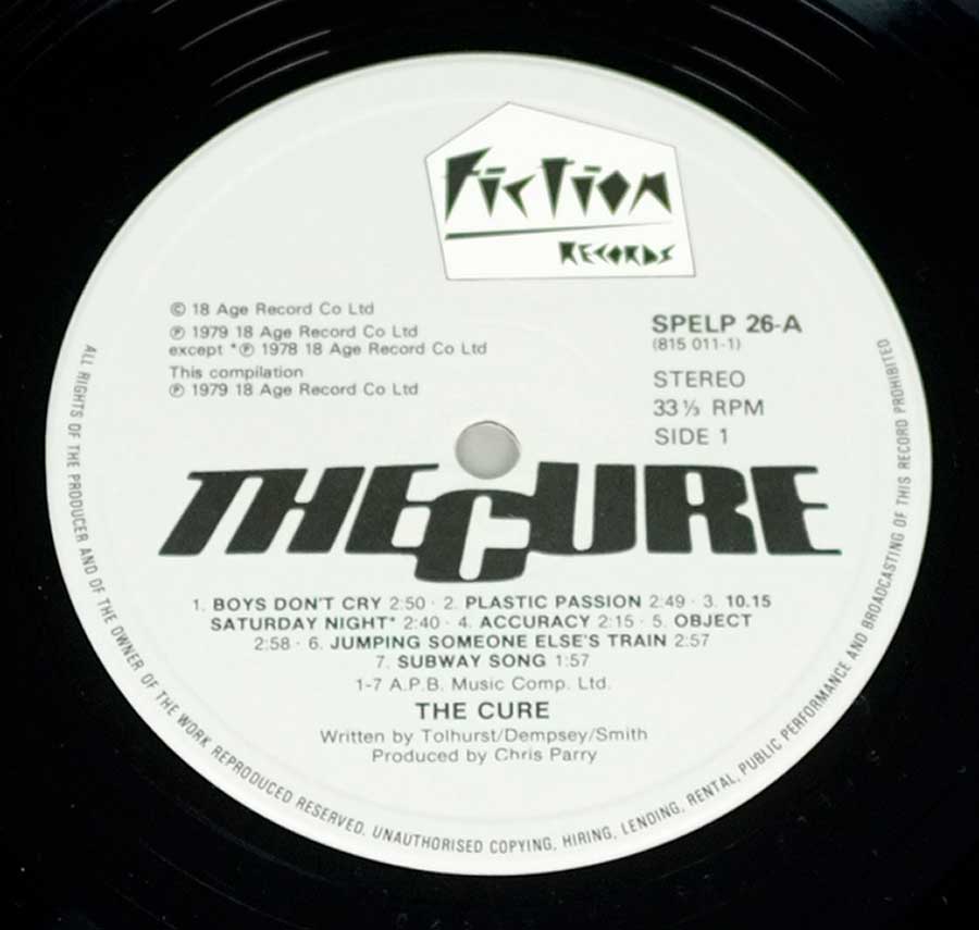 Close up of record's label THE CURE - Boys Don't Cry Fiction 12" LP Vinyl Album Side One