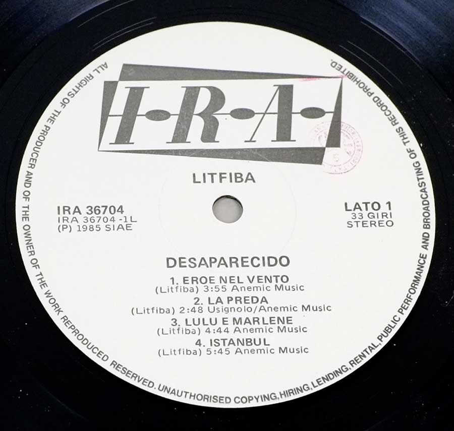 Close up of record's label LITFIBA – Desaparecido Italian Issue 12" Vinyl LP Album Side One