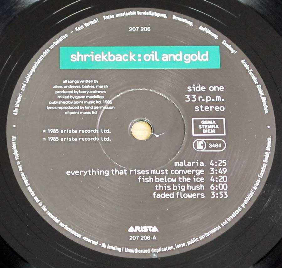 Close up of record's label SHRIEKBACK OIL AND GOLD 12" LP VINYL ALBUM Side One