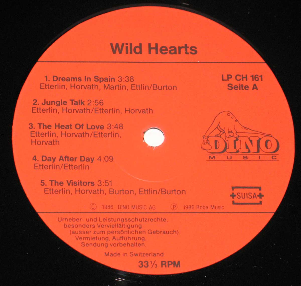Close-up Photo of "Wild Hearts" Red "Dino Music" LP CH 161 Record Label  