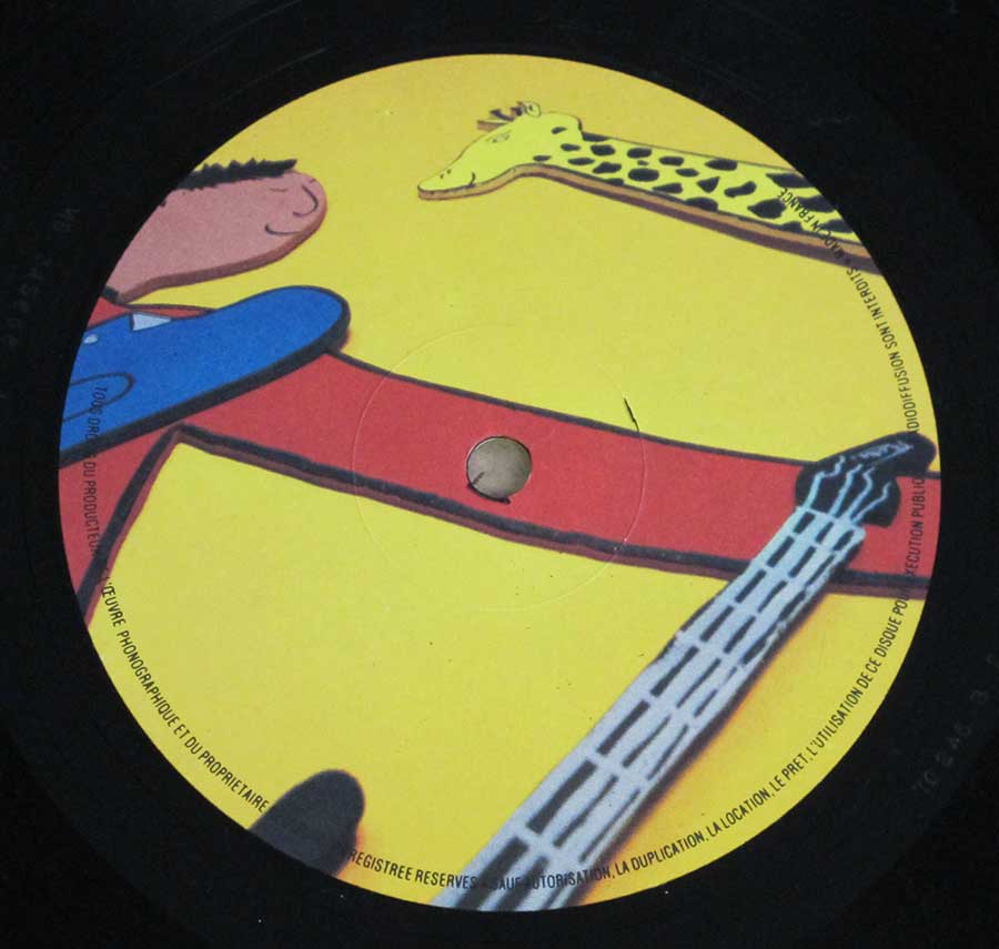 Close up of Side One record's label TELEPHONE - Un Autre Monde 12" LP VINYL Album