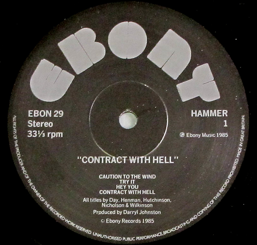 Close up of record's label HAMMER - Contract With Hell UK release NWOBHM 12" LP Vinyl Album Side One