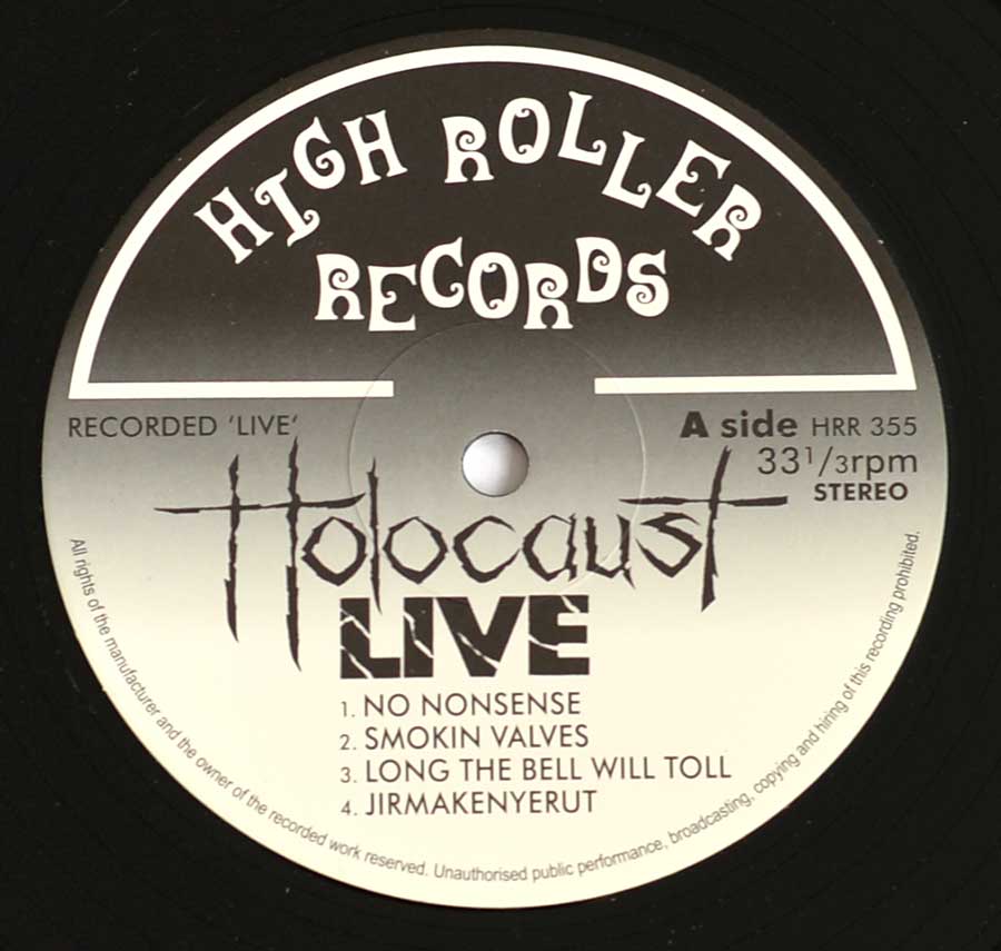 Close up of Side One record's label HOLOCAUST - Live (Hot Curry & Wine) + 7" EP and 