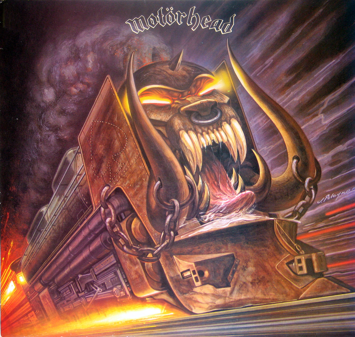 Album front cover of MOTORHEAD - Orgasmatron, showing the band’s snarling Snaggletooth mascot fused with a roaring locomotive, all tusks, chains, armour plates and furnace glare. The Motorhead logo sits at the top against purple smoke and stormy brushwork, while orange speed lines and sparks below make the whole sleeve feel like heavy metal being delivered by rail, badly maintained and probably uninsured.