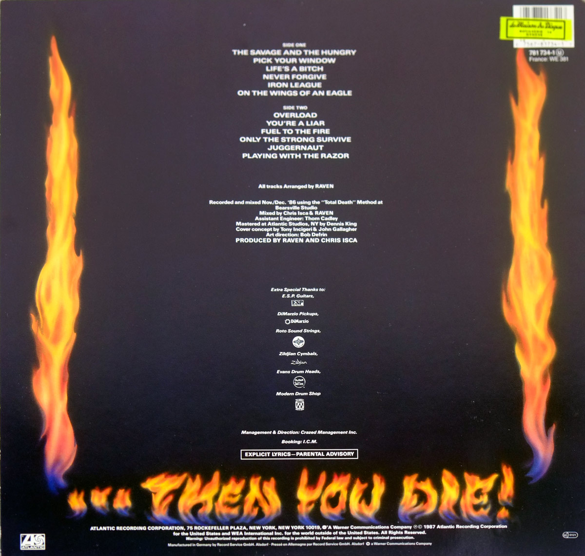 Back cover of Raven - Life's A Bitch 12 inch vinyl LP showing a black sleeve with orange flames along both sides and flaming text along the bottom. White centred production credits appear in the middle, with Atlantic logo at bottom left, barcode and catalog number 781 734-1 at top right, parental advisory box, and German manufacturing text along the lower edge.