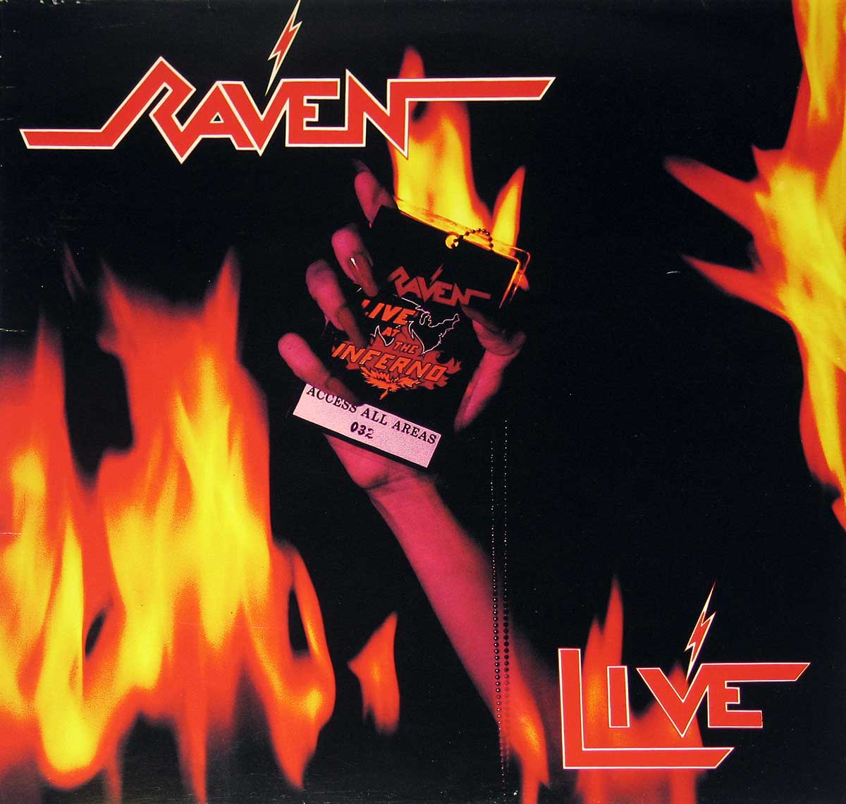 Album Front cover showing Raven Live at the Inferno with a black background, huge orange flames, the red Raven logo at the top left, and a raised hand holding a backstage pass that reads Live at the Inferno. The sleeve looks theatrical, hot, and gloriously unsubtle, exactly the sort of 1980s heavy metal cover that announces the racket before the needle even lands.