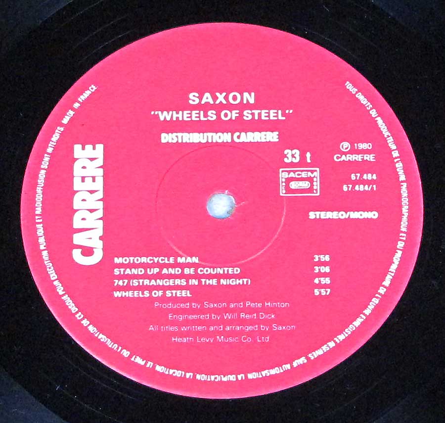 Close up of record's label SAXON - Wheels Of Steel ( France ) Side One