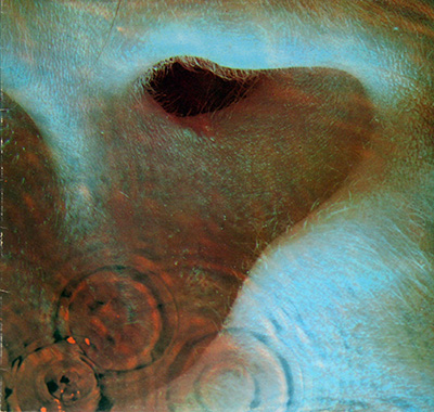 Pink Floyd - Today we mark the release of Meddle in 1971. Famously  featuring a close-up of an ear underwater, with some ripples, on the  standard cover, the reel-to-reel tape cover instead