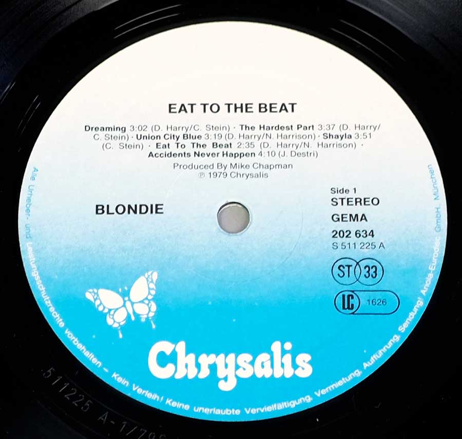 "Eat To The Beat" White and Blue Colour Chrysalis with White Butterfly Logo Record Label Details: Chrysalis 202 634, S 511 225 , LC 1626 