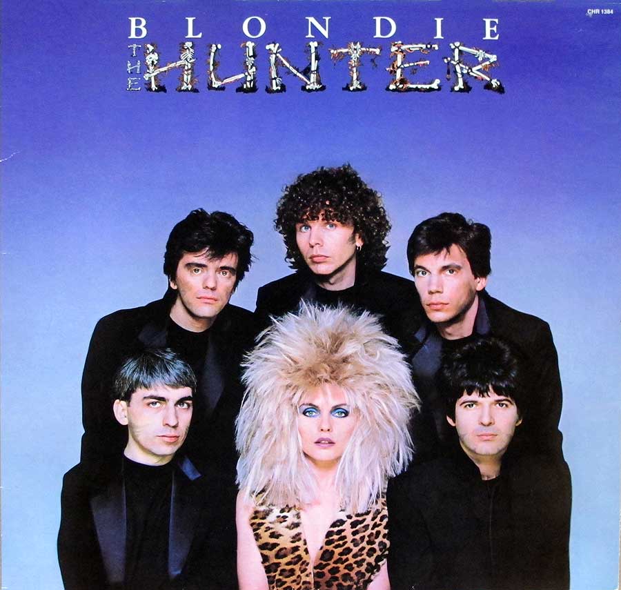 Photo of BLONDIE with extreme hair an her 5 band-membes 