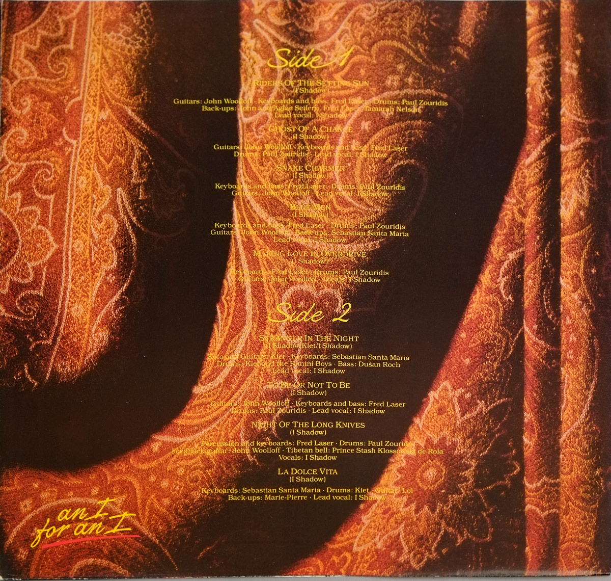 I SHADOW – An I For An I inner sleeve with full track-by-track musician credits printed in yellow over ornate red fabric.