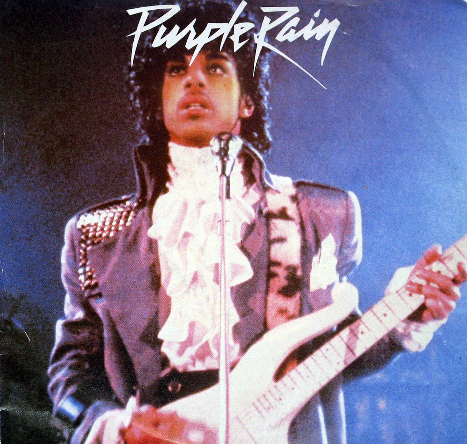 large album front cover photo of: the single purple rain  by prince 