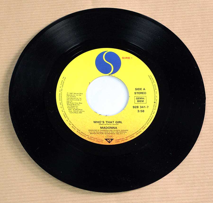 Close up of Side One record's label MADONNA - Who's That Girl 7" 45RPM Picture Sleeve SINGLE VINYL
