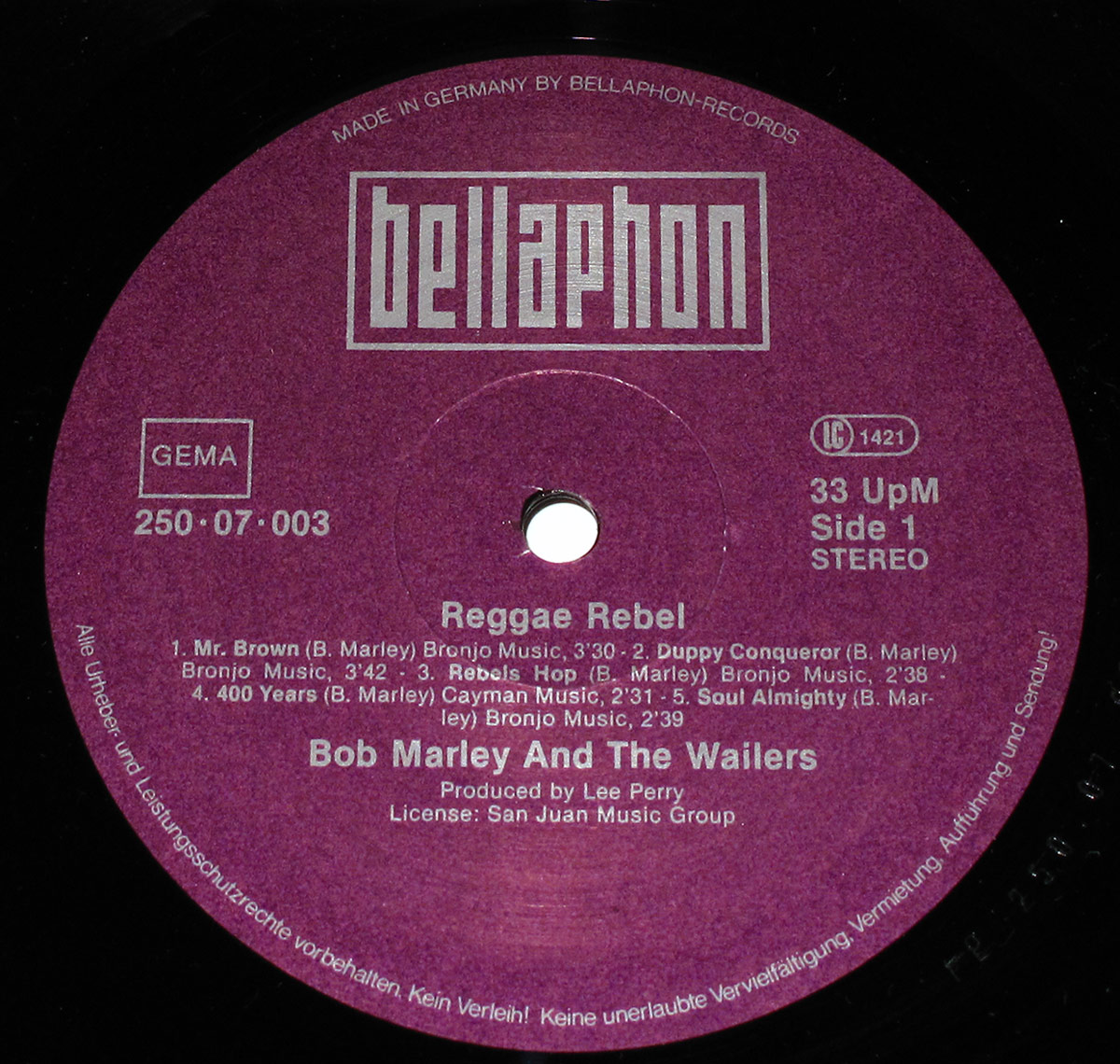 Side One label of Bob Marley and the Wailers' Reggae Rebel LP, Bellaphon release, showing track titles, durations, producer Lee Perry, and licensing info in white print on purple background.