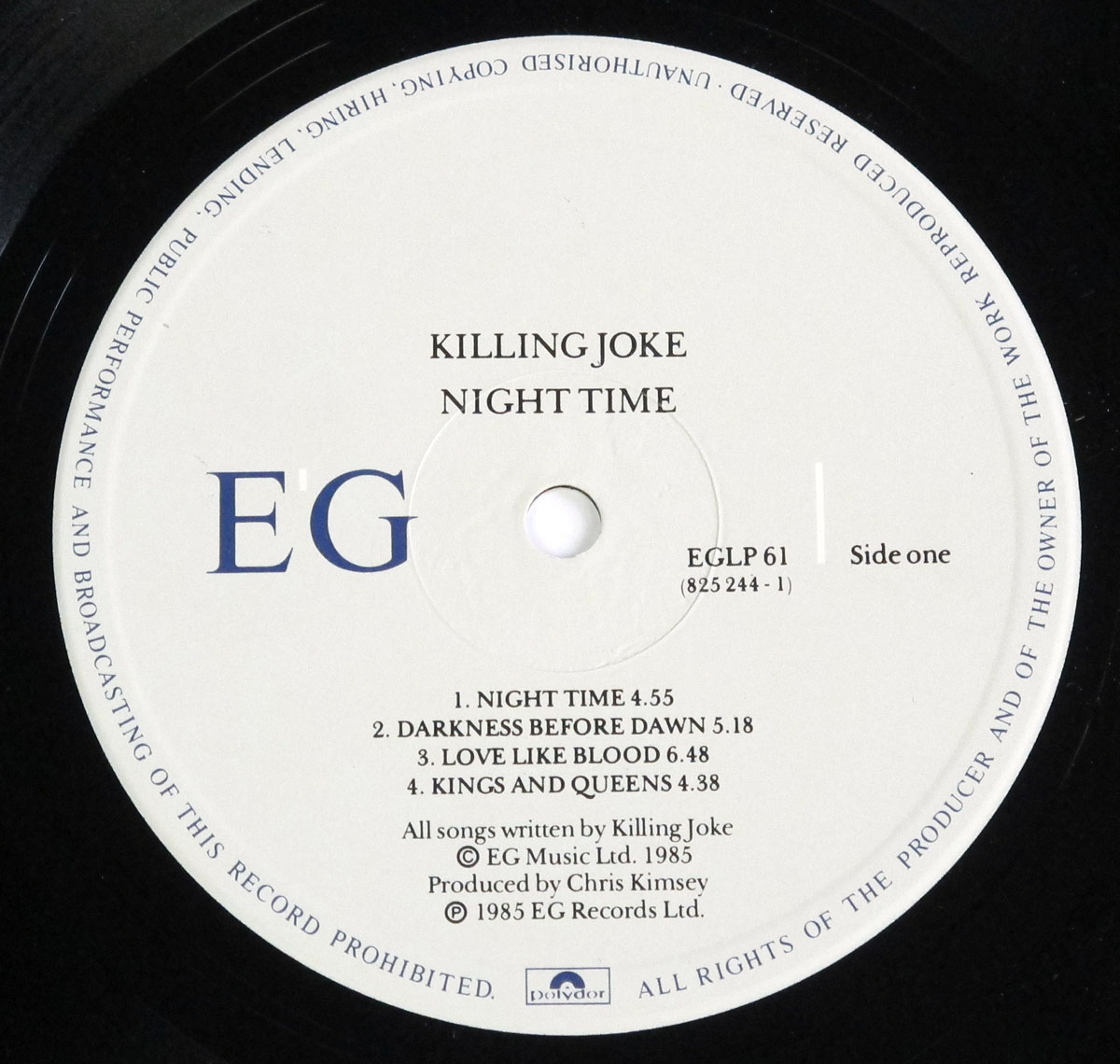 Close-up of the White "EG Records" record label for "Night Time".    
