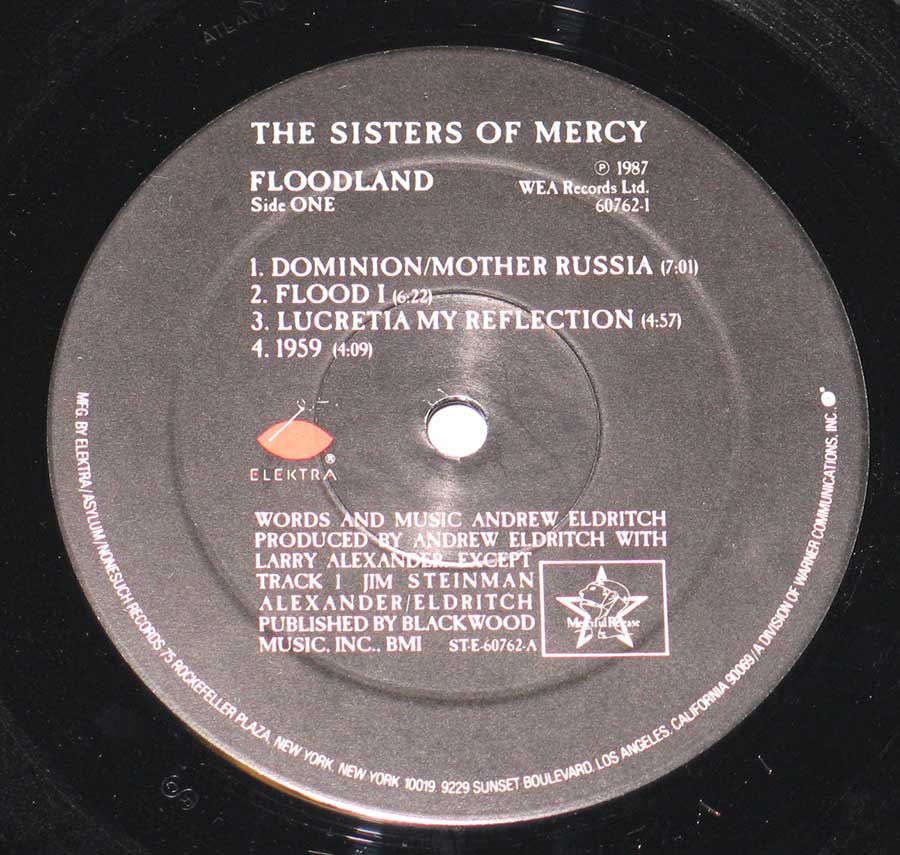 "Floodland" Black Colour WEA Elektra Record Label Details: WEA Elektra 60762-1 ℗ 1987 WEA Records Ltd Sound Copyright 