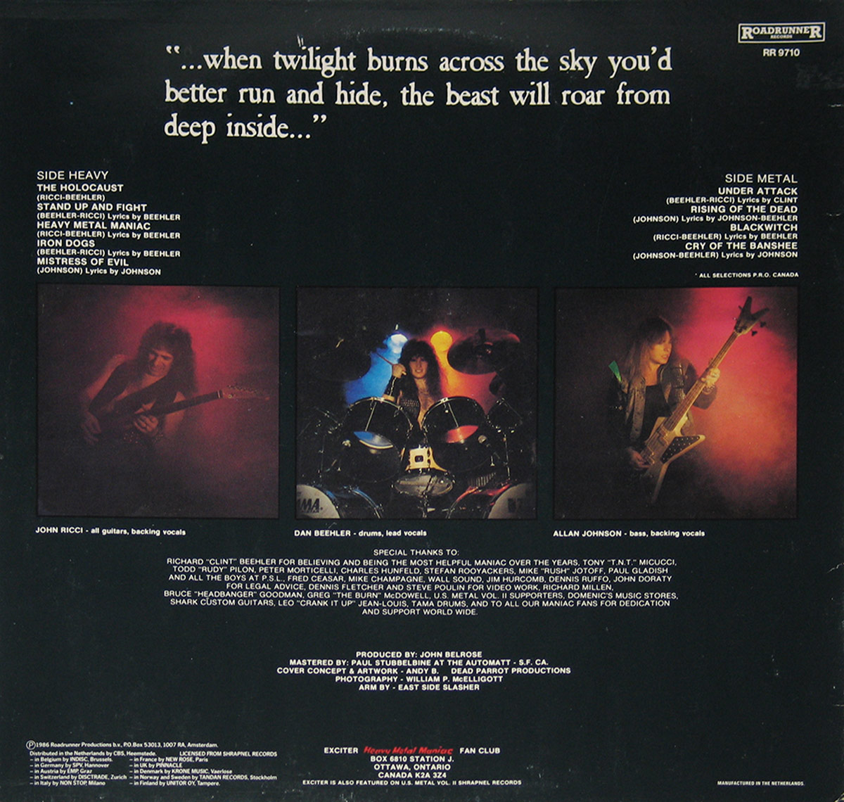 The back cover of Exciter’s Heavy Metal Maniac album features a black background with white text listing the track titles for Side Heavy and Side Metal. Below, three individual band member photos appear, each surrounded by a hazy red or blue glow. A quote in eerie white lettering looms at the top, enhancing the album’s dark, rebellious theme.