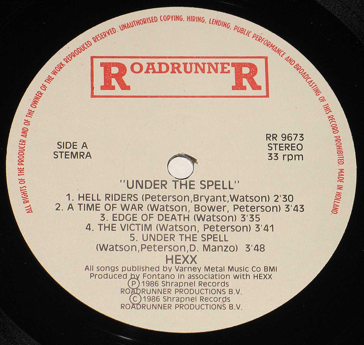Close up photo of the records label HEXX  - UNDER THE SPELL ( Holland release on RoadRunner ) 