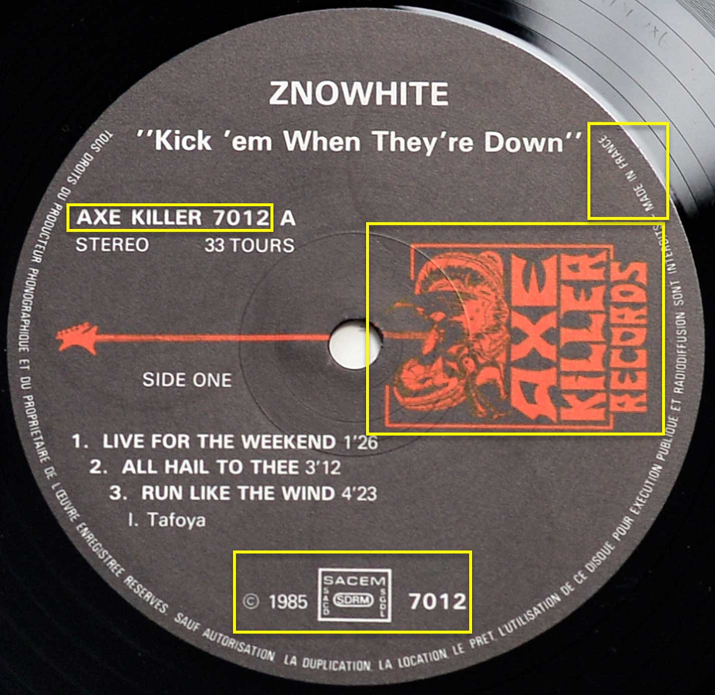 Photo of record label of ZNÖWHITE - Kick 'Em When They’re Down 