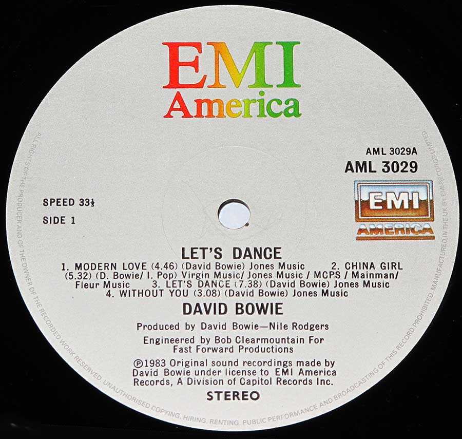 Close up of record's label DAVID BOWIE - Let's Dance Lyrics Sleeve 12" Vinyl LP Album Side One