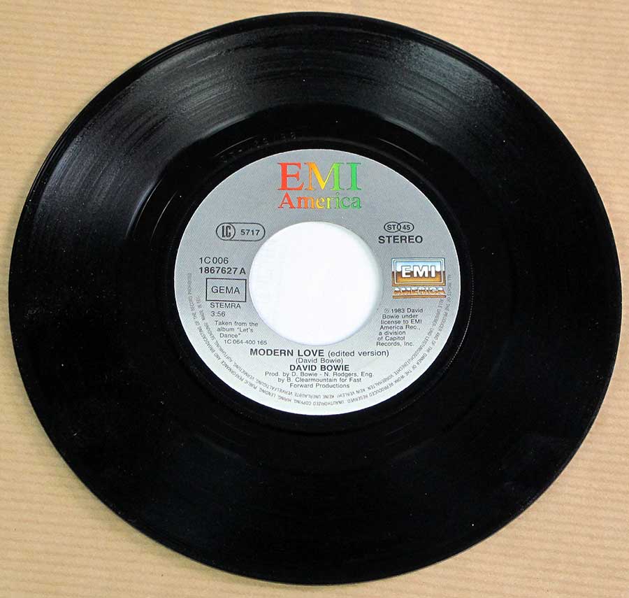 Close up of record's label DAVID BOWIE - Modern Love 7" 45RPM PS Single Vinyl Side One