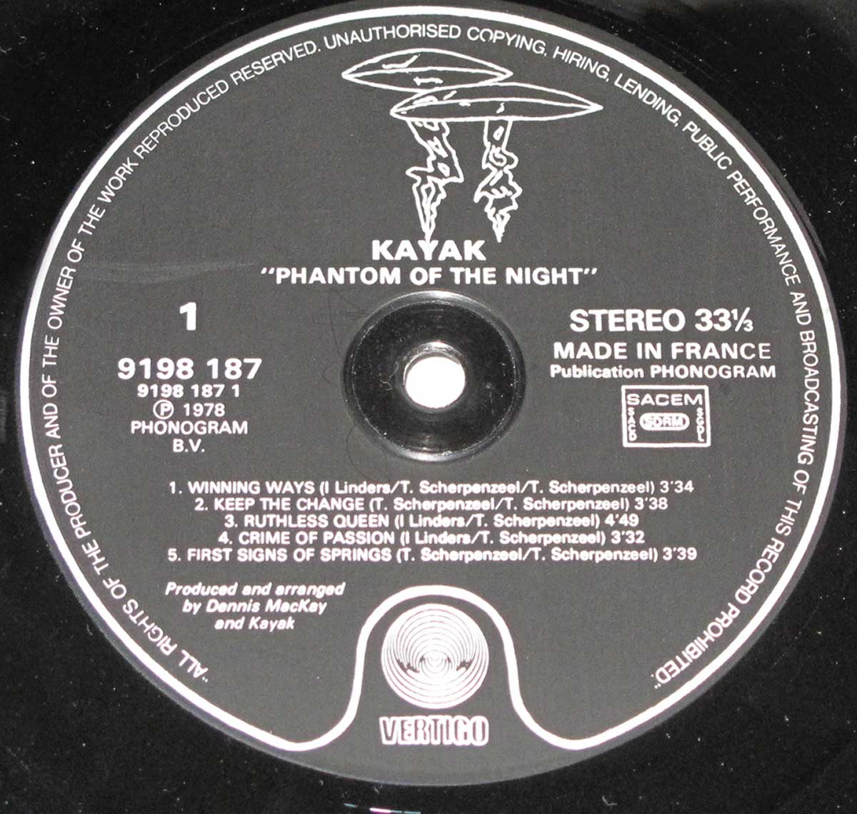 Close-up Photo of "KAYAK - Phantom of the Night" Black Vertigo Record Label  