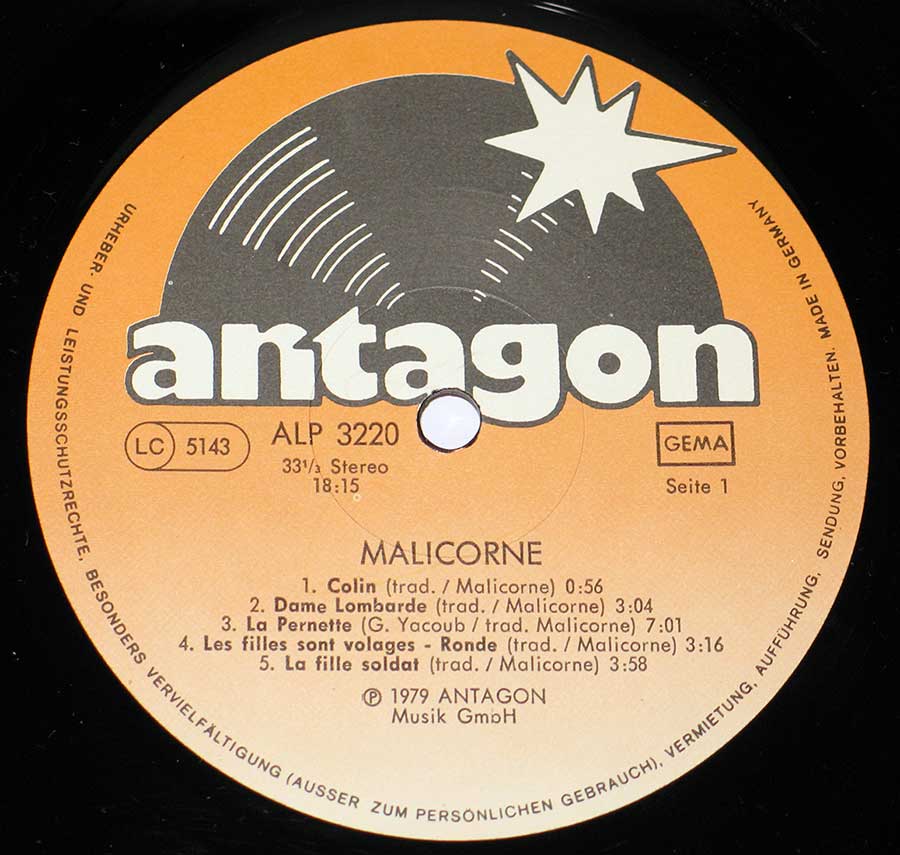 Close up of Side One record's label MALICORNE - 1 Colin - French Prog Rock Antagon 1979 12" Vinyl LP Album