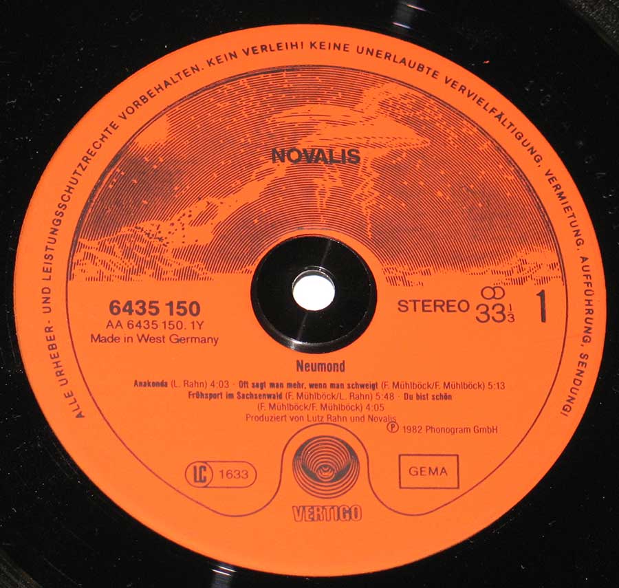 "Neumond" Orange Colour with two UFO's Vertigo Record Label Details: VERTIGO 6435 150, Made in West Germany ℗ 1982 Phonogram GMBH Sound Copyright 