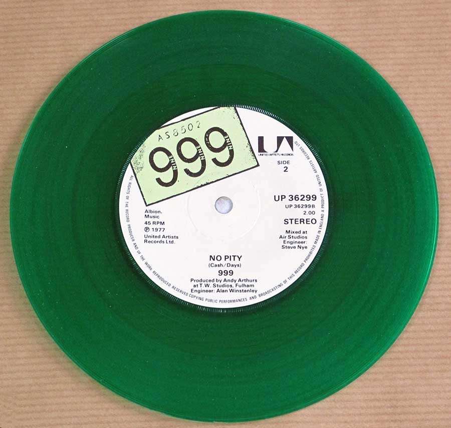 999 - Nasty Nasty / No Pity Green Vinyl 7" 45RPM PS SINGLE VINYL
 vinyl lp record 