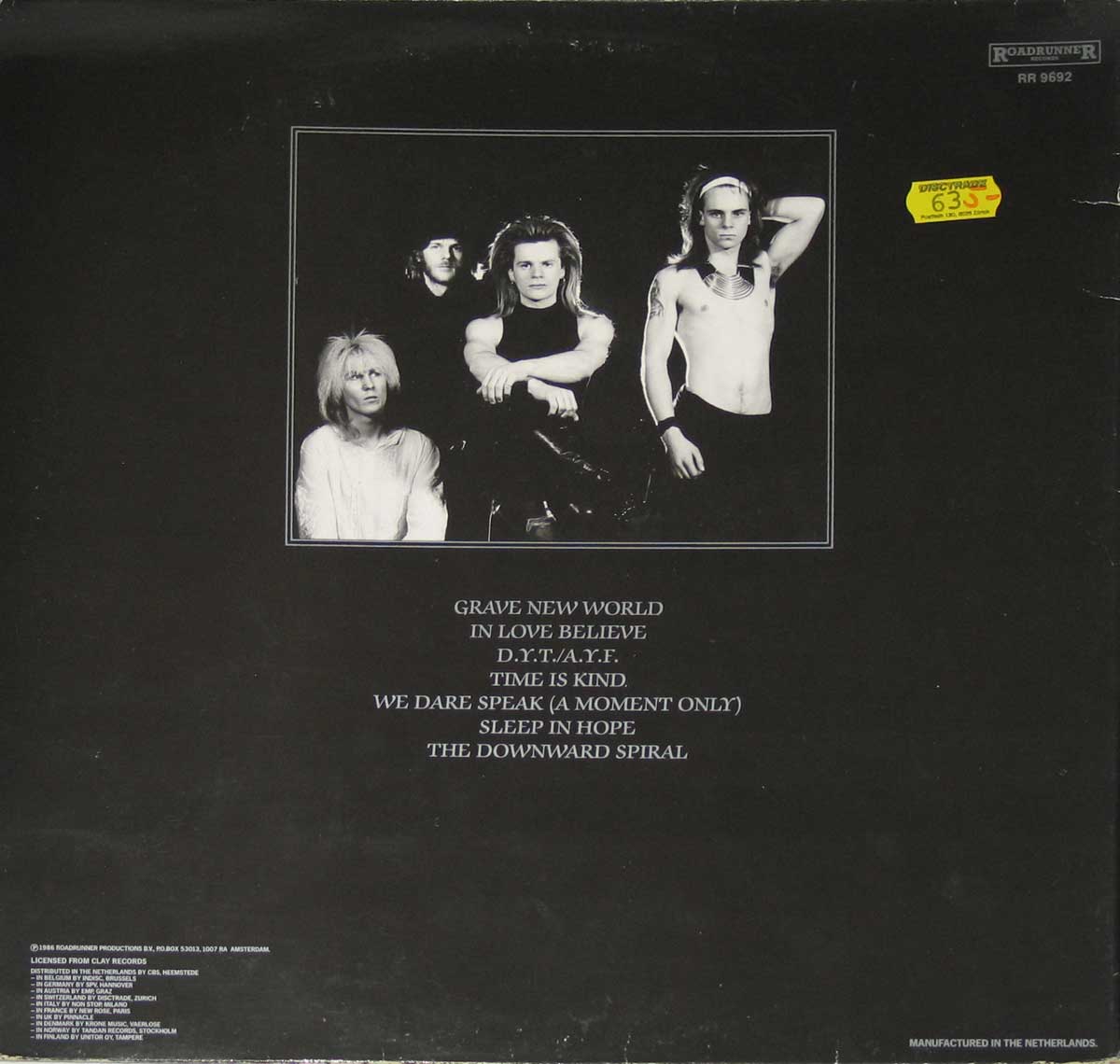 High Resolution Photo Album Back Cover of DISCHARGE - Grave New World https://vinyl-records.nl