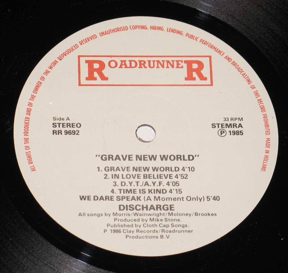 Enlarged High Resolution Photo of the Record's label DISCHARGE - Grave New World https://vinyl-records.nl
