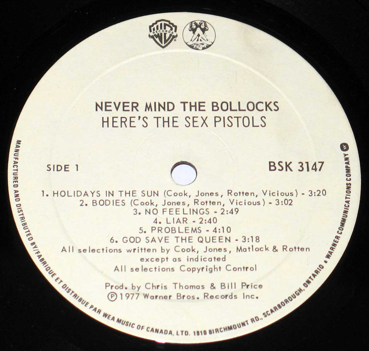 Photo of record label of SEX PISTOLS - Never Mind the Bollocks ( Pink Album Cover )  