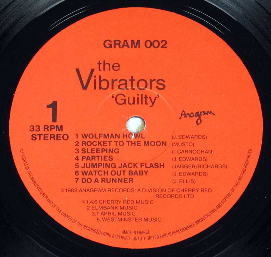 Close-up of Record Label Photo VIBRATORS - Guilty  Vinyl Record Store https://vinyl-records.nl//