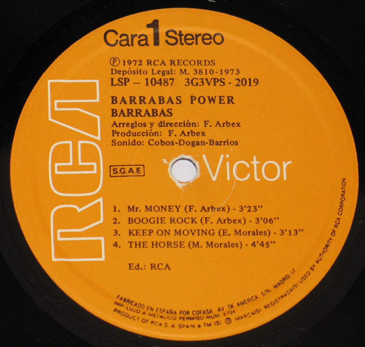 Close-up of the RCA Victor orange record label for 'Power' by Barrabás, Side 1, featuring track titles, production credits, and copyright details in bold white text against an orange background.