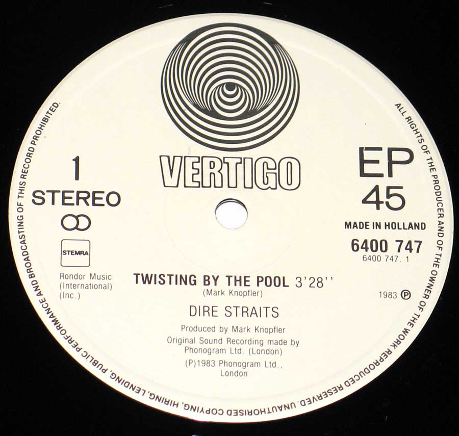 Close up of record's label DIRE STRAITS - Twisting By the Pool Side One