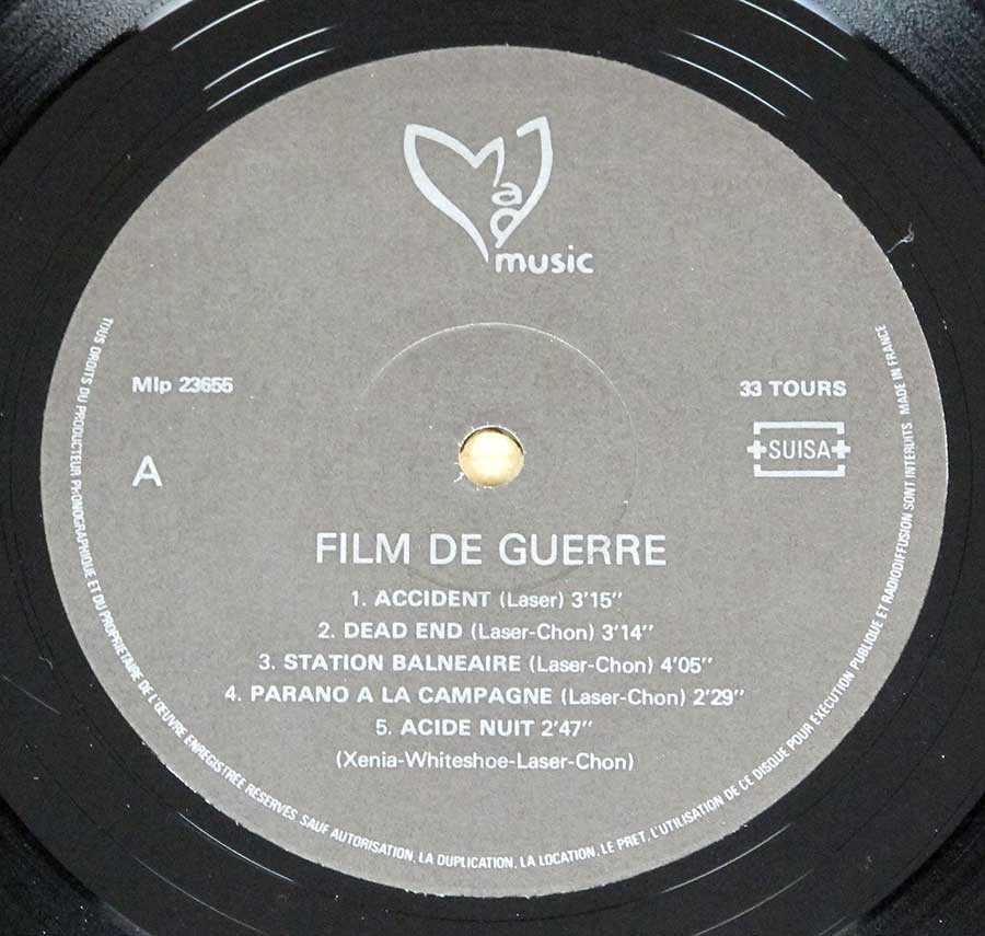 "Film De Guerre" Grey Colour Record Label Details: M.Records Mauley Music , Mad Musi MLP 23666 