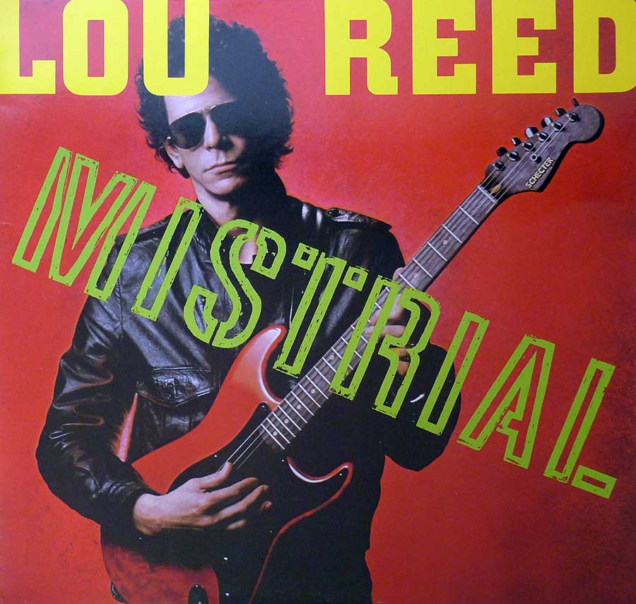 Photo of Lou Reed playing a Schecter Electric Guitar on the front cover of Mistrial 