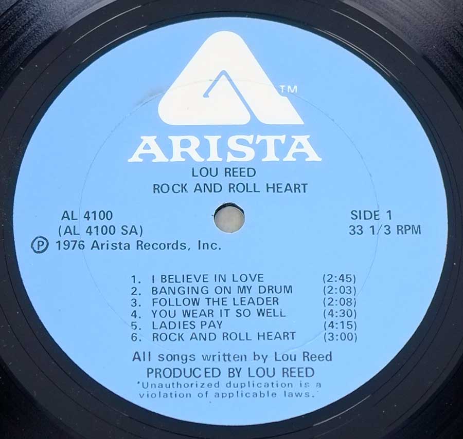 Close up of record's label LOU REED - Rock And Roll Heart Side One