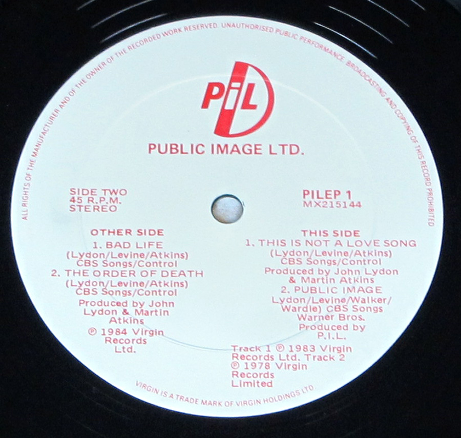Close up of record's label PIL PUBLIC IMAGE LTD - Limited Edition Australian Tour Souvenir 12" Maxi-Single Vinyl Side One