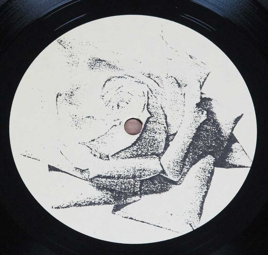 Close up of record's label THE ESSENCE - Purity Midnight Music 12" LP Vinyl Album Side One