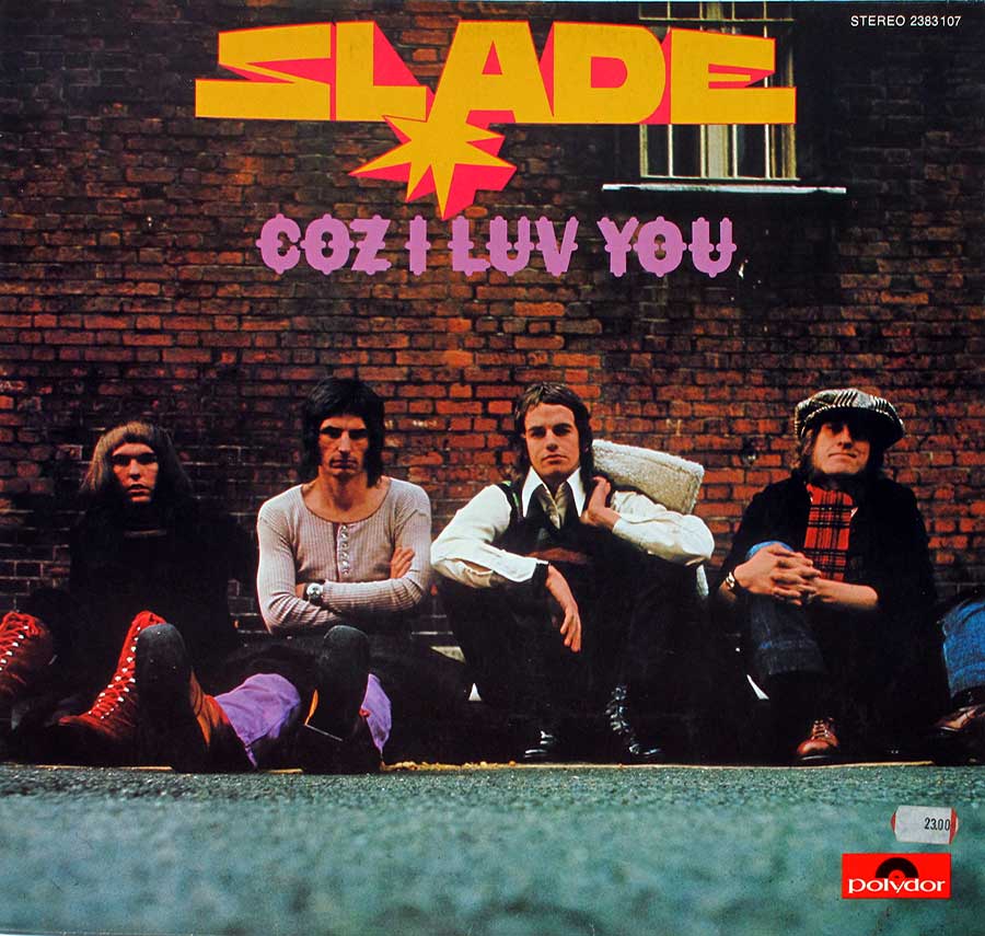 Photo of the SLADE band in front of brick wall on the front cover 