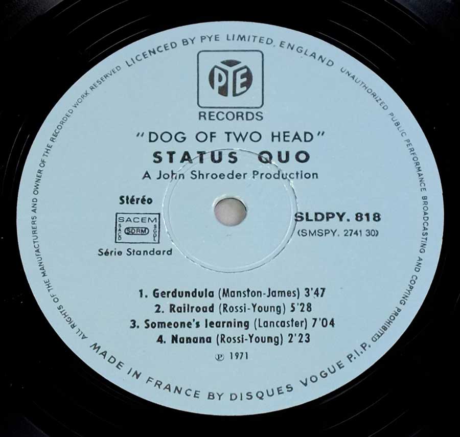 Close up of record's label STATUS QUO - Dog of Two Head ( Gatefold Cover ) Side Two